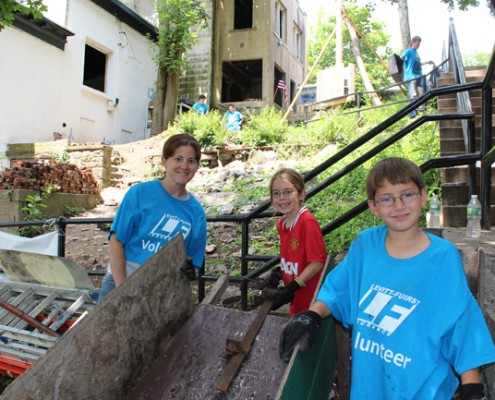 People building house