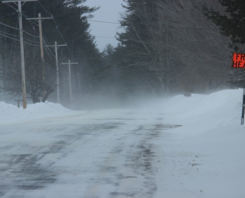 Frost Heaves snow covered road